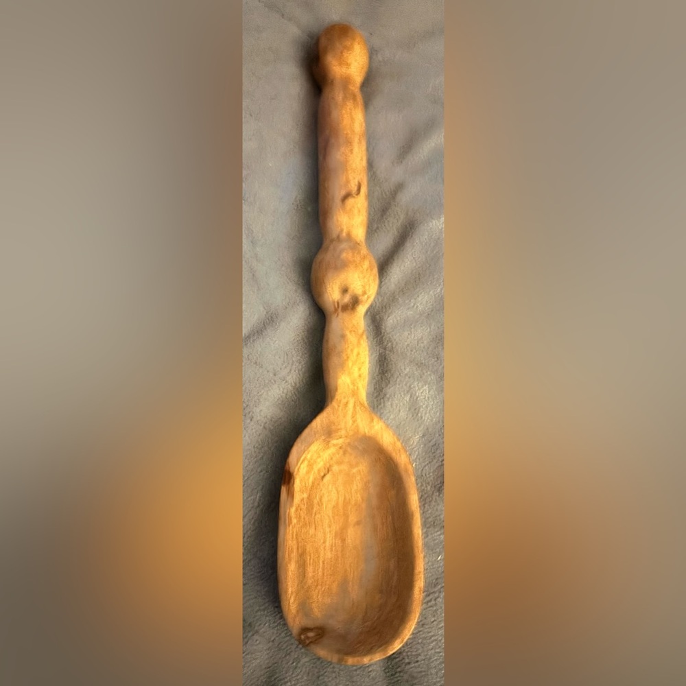 Primitive Handcarved Spoon from hardwood such as walnut, cherry, or maple.